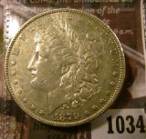 1034 . 1879 Morgan Silver Dollar, AU, value $40