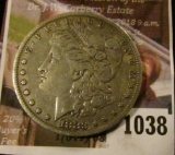 1038 . 1883-O Morgan Silver Dollar, VF/XF, VF value $32, XF value $