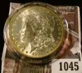 1045 . 1888-O Morgan Silver Dollar, BU, MS63+, MS63 value $75, MS64