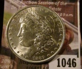 1046 . 1889 Morgan Silver Dollar, BU, MS63 value $70, MS64 value $9