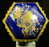 Enameled Jewelry Box with Carriage design with an interesting assortment of costume Jewelry.