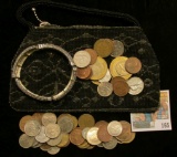 An antique Beaded & Zippered Purse containing a very interesting Bracelet & a large variety of Forei