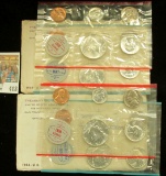 A pair of 1964 P & D U.S. Mint Sets, Original as issued in envelopes and cellophane.