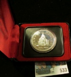 1976 Royal Canadian Mint (RCM) Silver Dollar.