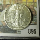 1945 D Walking Liberty Half Dollar, AU 58.