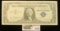 1556 _ Series 1957B $1 U.S. Silver Certificate. Near Crisp Unc. Small centralized rust spot.