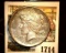 1714 _ 1921 P U.S. Silver Peace Dollar, Choice AU. Gold toning.