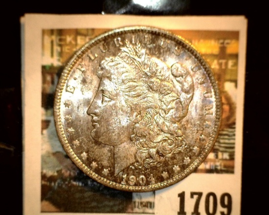 1709 _ 1904 O U.S. Silver Morgan Dollar, Choice BU 63. Superb toning.
