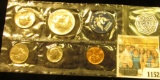 1152 _ 1965 U.S. Special Mint Set in original envelope of issue & 1976 U.S. Three-Piece Silver Mint