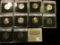 (10) Jefferson Nickels in hard plastic cases dating 1983S-86D and includes both BU and Proof specime