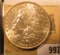 1883 O U.S. Morgan Silver Dollar, Brilliant Uncirculated.