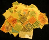 Large selection of late 1800 early 1900 Cigarette Tax Stamps, both mint and used as well as in vario