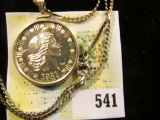 1981 One-Quarter Ounce .999 Fine Silver Proof American Eagle in a Sterling Silver bezel with chain,