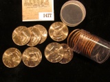 1477 _ 2013 P Solid-date Roll of Kennedy Half Dollars. Gem BU, stored in a plastic tube.