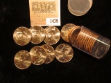 1479 _ 2013 P Solid-date Roll of Kennedy Half Dollars. Gem BU, stored in a plastic tube.