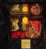 1533 _ Mirrored Plastic Jewelry Box with swirled wood design containing a variety of old Costume Jew