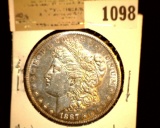 1098 _ 1887 S Morgan Silver Dollar, AU Bag marks.