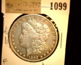 1099 _ 1892 S Morgan Silver Dollar, Fine. Baggy.
