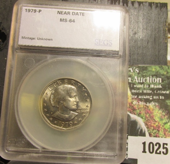 1025 . 1979 near date Susan B Anthony dollar graded MS 64.  This i