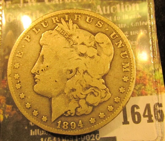 1646 . 1894 O U.S. Silver Morgan Dollar. Key date.