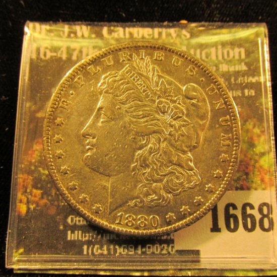 1668 . 1880 CC Morgan Silver Dollar. Some damage. Sold as is.