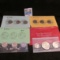 1979, 80, & 81 Susan B. Anthony Dollar Coin Three-piece Sets in original envelopes and cellophane; &