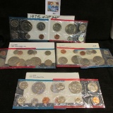 1974, 75, 76 & 77 U.S. Mint Sets, all in original cellophane, all but the 1975 have envelopes. (Issu