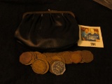 Antique Leather Change purse containing a handful of Old Good For Tokens.