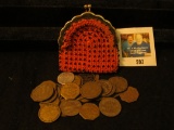 Antique Beaded Coin purse containing a handful of Old Good For Tokens.