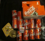 Class of 2000 Coca-Cola Bottle in a six-pack holder; (11) miniature Coca-Cola Cans; & 1985 Medallic