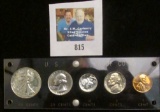 1941 U.S. Proof Set in a black Capital style lucite holder, missing all but two of the screws. A ver