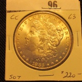 1883 CC Brilliant Uncirculated Morgan Silver Dollar with a light hint of golden toning.