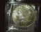 1883 O U.S. Morgan Silver Dollar, Brilliant Uncirculated.