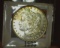 1887 P U.S. Morgan Silver Dollar, Gem Brilliant Uncirculated with spectacular Gold toning.