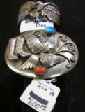 Belt Buckle with Turquoise and Coral insets, Wester Design & a Silver American Eagle Bracelet. 'Doc'