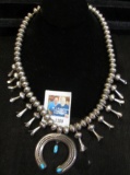 Classic Navajo Sterling Silver Squash Blossom Necklace with turquoise inlays. Signed on back.