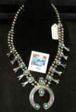 Classic Navajo Sterling Silver Squash Blossom Necklace with turquoise inlays. Signed on back.