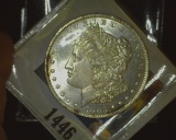1883 O U.S. Morgan Silver Dollar Semi-prooflike, Gem BU, with light toning areas.