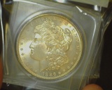 1886 P U.S. Morgan Silver Dollar, Gem Brilliant Uncirculated. Hints of Gold toning. Stored in a Snap