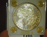 1885 O U.S. Morgan Silver Dollar, Gem Brilliant Uncirculated with a hint of peripheral toning. Store