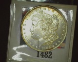 1885 P U.S. Morgan Silver Dollar, Brilliant Uncirculated with scattered toning.