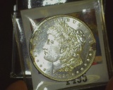 1886 P U.S. Morgan Silver Dollar, Gem Brilliant Uncirculated. With scattered toning.
