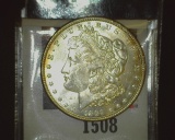 1889 P U.S. Morgan Silver Dollar, Brilliant Uncirculated slightly toned.