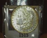 1889 P U.S. Morgan Silver Dollar, Brilliant Uncirculated with light toning.