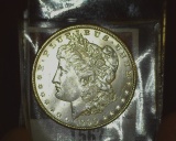 1900 P U.S. Morgan Silver Dollar, Brilliant Uncirculated.