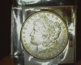 1900 O U.S. Morgan Silver Dollar, Brilliant Uncirculated.