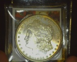 1904 O U.S. Morgan Silver Dollar, Brilliant Uncirculated. Lovely hints of toning.