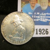 1920 Pilgrim Tercentenary Commemorative Half Dollar in Gem BU with hints of toning.