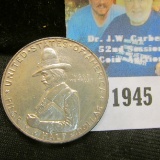 1920 Pilgrim Tercentenary Commemorative Half Dollar in Almost Uncirculated with hints of toning.