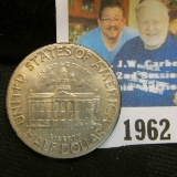 1946 Iowa Centennial Commemorative Half Dollar, Gem Brilliant Uncirculated with a touch of toning.